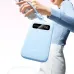 Woman holding a smartphone connected to a light blue UGREEN PB522 power bank with a lanyard and 100% battery displayed.