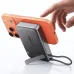 Acefast M40 22.5W 10000mAh Power Bank magnetically attached to a smartphone in kickstand mode.