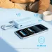 Compact Anker power bank with built-in Type-C cables beside smartphone, showing size, weight, and portable design