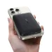 Enerfill FM11 wireless power bank magnetically charging a smartphone in hand.