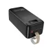 Lying angled view of Hoco DB82 Power Bank showing USB and Type-C ports, power button, and curved beige carrying strap.