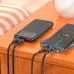 Charging setup with Hoco J121 10000mAh 22.5W Fast Charging Power Bank connected to smartphone and devices