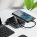 Angled view of Hoco Q47 Shine 10000mAh PD 20W Power Bank charging a smartphone on a desk.