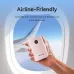 VENTION FKBL0-C power bank held by a hand inside an airplane, showing that it is airline-friendly.