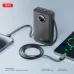 XO PR272 22.5W 10000mAh Power Bank, in-use view charging a smartphone with built-in cable and portable power setup