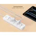 Usage view of Huntkey DMC502 Power Strip with universal sockets powering multiple devices near tablet.