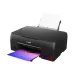 Canon Pixma G670 Color Printer shown in angled rear view printing a colorful photo from the output tray.