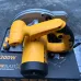 Packaged view of Tolsen 79532 Circular Saw Machine placed on box with metallic blade guard and sturdy handle.