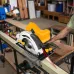 Workshop view of Tolsen 79532 Circular Saw Machine cutting wood with red laser guide line for precision.