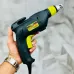 Handheld view of XCORT XPL01-6A Drywall Screwdriver with metallic tip and brand label visible.