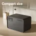 Front view of compact Deli VS4529-WH Digital Safe with keypad and dial placed on desk beside cabinet and pen holder.