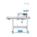 A white and blue Jack A2C-C industrial sewing machine mounted on a metal table with a foot pedal and thread stand.