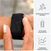 Wrist view of Garmin CIRQA Smart Band in black fabric strap highlighting activity detection and battery life features.