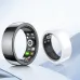 A black and a white Riversong Trinity smart ring side-by-side, showcasing the clear casing with internal green lights on the black ring.