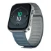Angled close-up of the boAt Chrome Endeavour smartwatch with a silver frame and a blue/grey ribbed silicone strap, displaying a digital watch face.