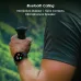 A hiker wearing a black smartwatch on their wrist with an incoming call displayed. Text highlights Bluetooth Calling features.