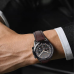 Lifestyle wrist view of Havit M9031 Pro Smart Watch worn with formal attire highlighting elegant design and multi-dial watch face