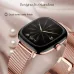 Close-up of Titan AiRA smartwatch with rose gold mesh strap showing step count and elegant starburst display.