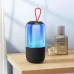 BWOO BO-BS88 portable speaker on a shelf, showing its base speaker mesh and blue/cyan illuminated top section.