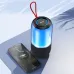 BWOO BO-BS88 portable speaker next to a smartphone playing music, highlighting the blue glowing light and red strap.