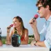 Outdoor view of Hoco DS68 RGB Portable Bluetooth Speaker with LED strip used for karaoke between two people.