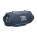 Side view of JBL Xtreme 5 in dark blue finish with LED accents and control buttons on top surface.