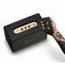 Marshall Stanmore III Bluetooth Speaker angled view with hand adjusting controls on top panel