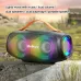 Outdoor lifestyle view of Unikyy Eagle 40W Portable Bluetooth Speaker with LED lights and carry strap on concrete surface