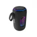 Angled view of Unikyy S7 Portable Bluetooth Speaker showing compact cylindrical body with side grip and LED light panel detail