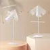 Product view of Xiaomi Flexible Rechargeable Lamp showing 180° tilt and 360° rotation adjustability on desk surface.