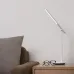 Living room view of Yeelight Z1 Pro Table Lamp beside sofa and glasses on wooden side table with slim light bar.