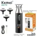 Set view of Kemei KM-779 Hair Trimmer with three trimming heads, USB cable, brush, and product box.