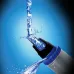 Close-up of Panasonic ER-GN30K Nose Trimmer nozzle expelling water stream, highlighting easy-clean design.