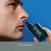 Usage view of Panasonic ER115KP Nose Trimmer near nostril showing nose hair grooming function.
