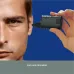 Close-up of Panasonic ER115KP Nose Trimmer near ear demonstrating ear hair grooming capability.