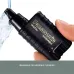 Handheld view of Panasonic ER115KP Nose Trimmer being rinsed under running water highlighting washable feature.