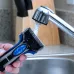 Close-up of Panasonic ES-SA40 Shaver held under faucet with water rinsing foil head for easy cleaning.