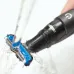 Feature view of Philips BG1024/16 Trimmer head rinsed under running water, showcasing waterproof and easy-clean design.