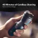 Close-up of Philips S1151/00 Shaver in hand with green power light, offering 40 minutes cordless use after 10-hour charge.