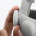 Close-up of Apple Vision Pro adjustment knob on fabric strap, highlighting ergonomic design and tactile control.